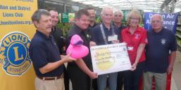 Miggie Little from DAAT receiving 250 from Homebase